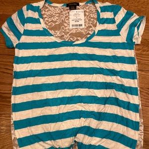 Very cute shirt never worn it is a little wrinkled but I will iron it